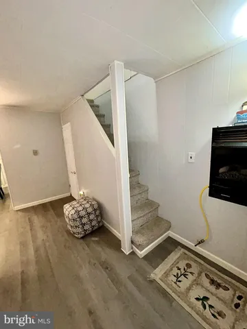 a view of livingroom with furniture and wooden floor