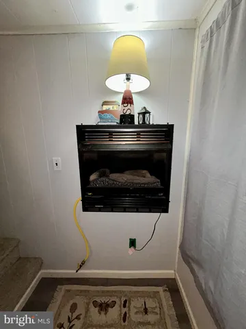 a stove top oven sitting inside of a kitchen