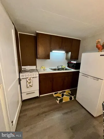 a living room with a couch and a table