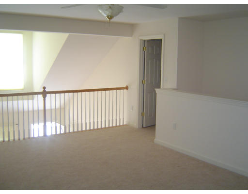 53 Brookview Road, Unit 53 Windham, NH 03087 - Photo 8 of 13 a view of a hallway