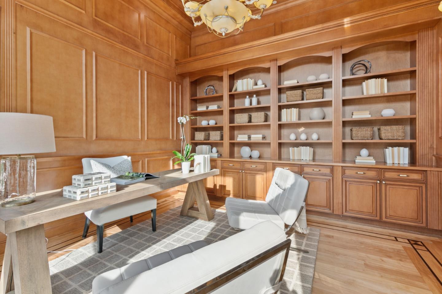 779 Mora Drive Los Altos, CA 94024 - Photo 17 of 81 a reading room with furniture a rug and a book shelf