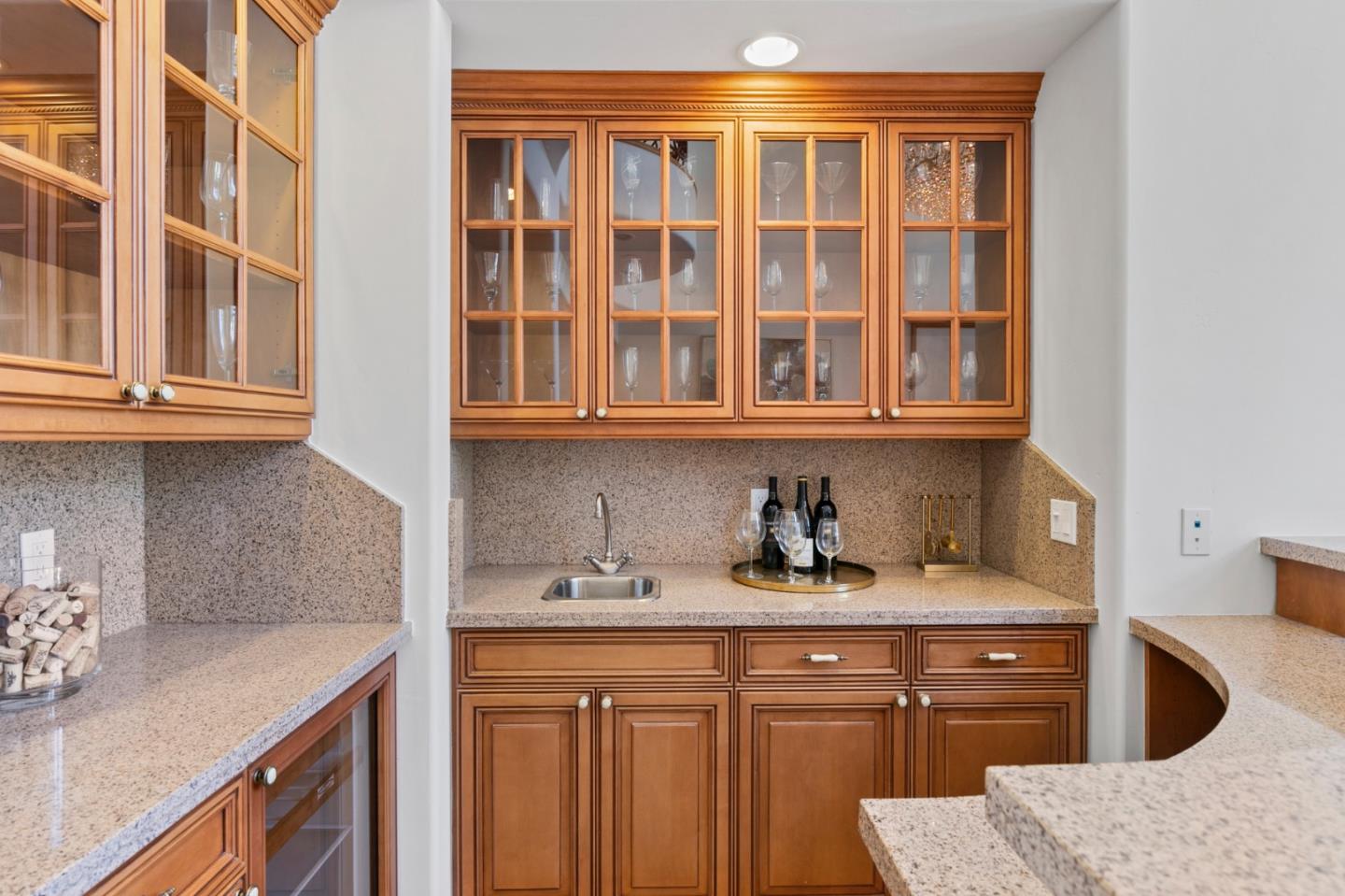 779 Mora Drive Los Altos, CA 94024 - Photo 25 of 81 a kitchen with stainless steel appliances granite countertop a sink stove and cabinets