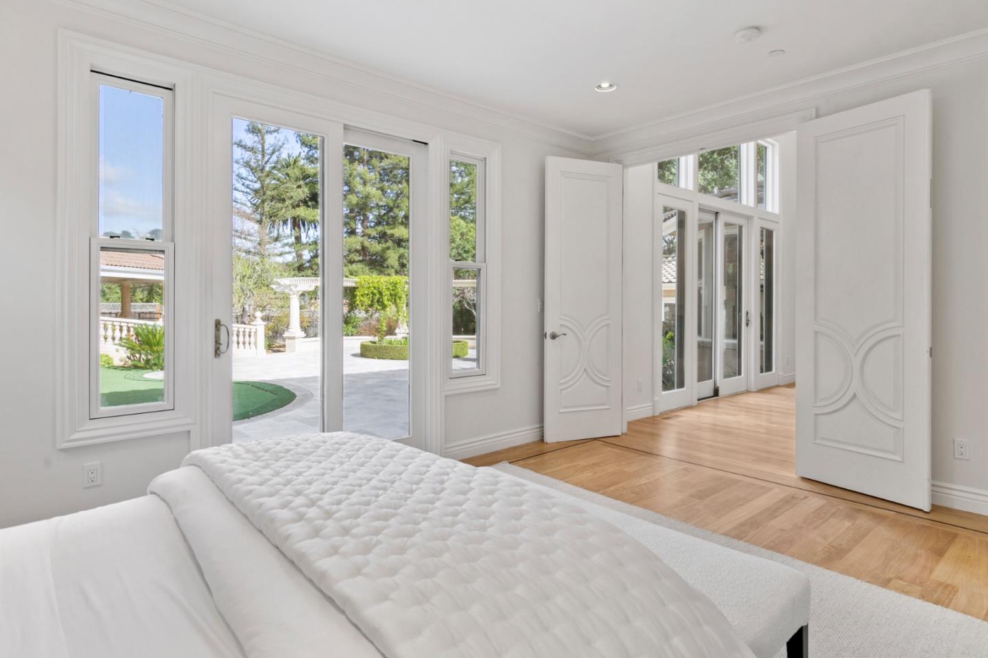 779 Mora Drive Los Altos, CA 94024 - Photo 40 of 81 a bedroom with a large bed and a window