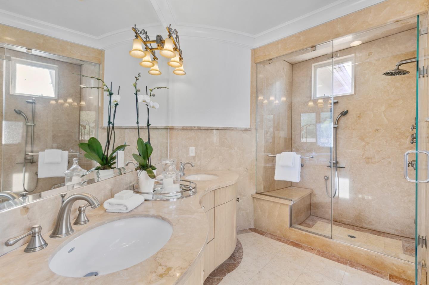 779 Mora Drive Los Altos, CA 94024 - Photo 55 of 81 a bathroom with a double vanity sink mirror and shower