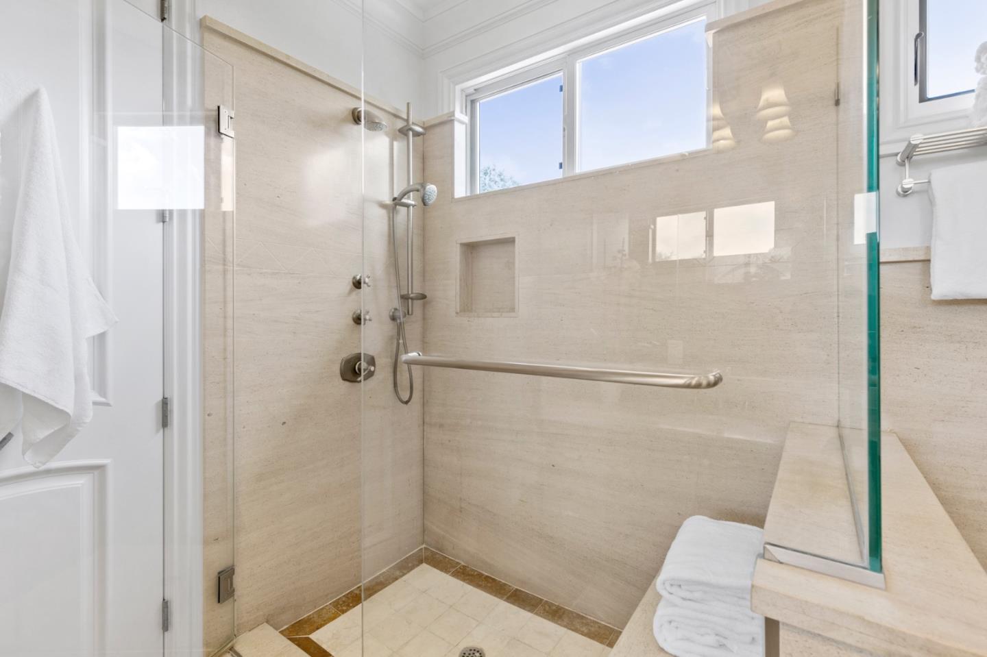 779 Mora Drive Los Altos, CA 94024 - Photo 59 of 81 a bathroom with a granite countertop shower a toilet and a sink