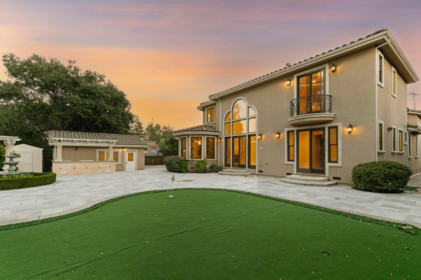 779 Mora Drive Los Altos, CA 94024 - Photo 6 of 81 a front view of a house with a yard and trees