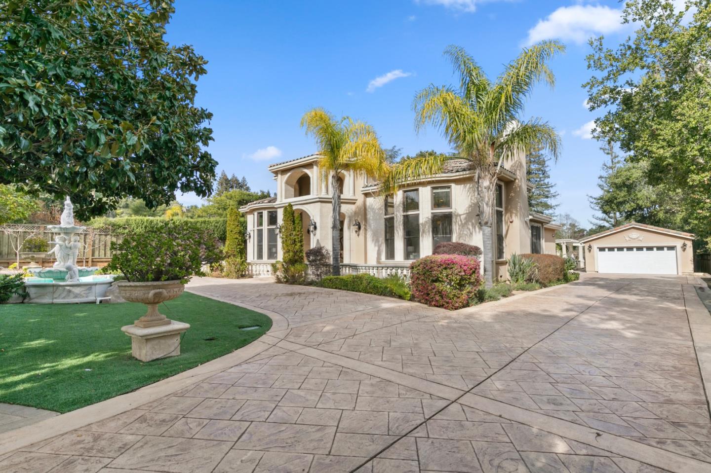779 Mora Drive Los Altos, CA 94024 - Photo 73 of 81 a front view of a house with garden