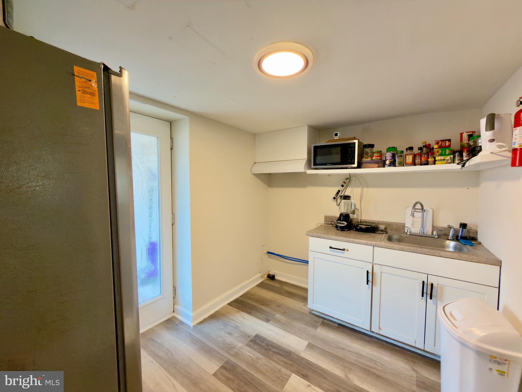 16720 Longdraft Road Gaithersburg, MD 20878 - Photo 24 of 40 Basement Kitchenette