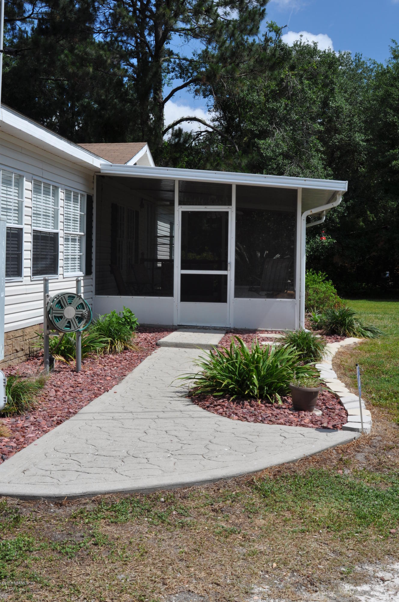 12476 Boney Road Jacksonville, FL 32226 - Photo 3 of 26 Front Screen Porch Entry