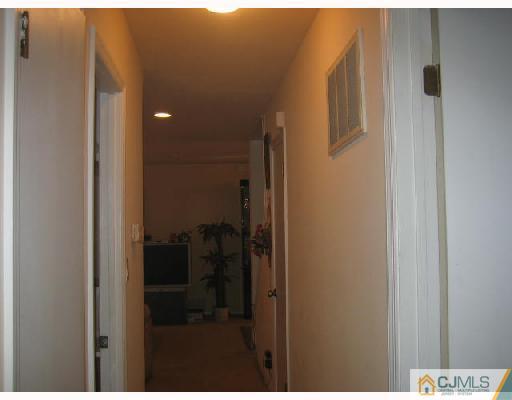 14 New Dover Road Iselin, NJ 08830 - Photo 9 of 10 a bathroom with a glass shower door