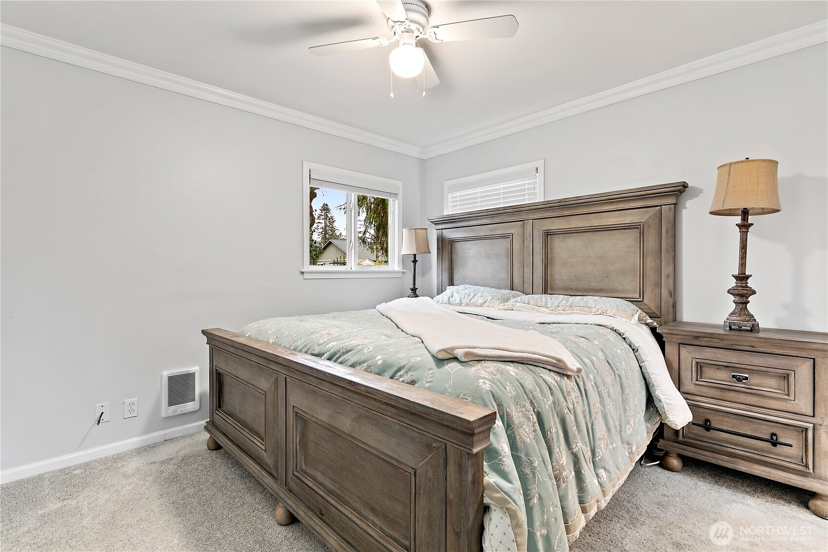 111 East Cindy Road Centralia, WA 98531 - Photo 12 of 17 a bedroom with a bed and a chandelier