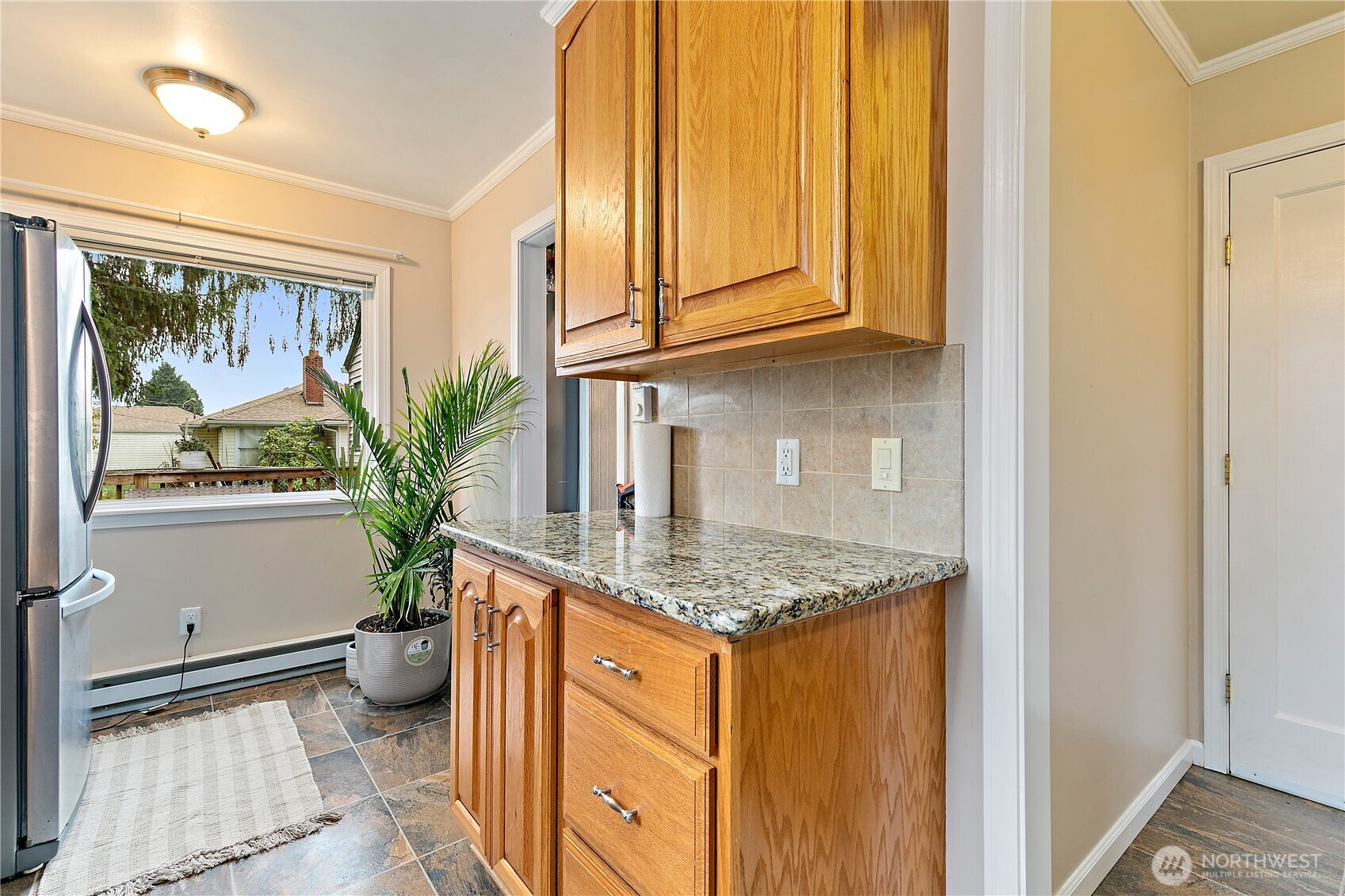 111 East Cindy Road Centralia, WA 98531 - Photo 8 of 17 a bathroom with a granite countertop sink and a mirror