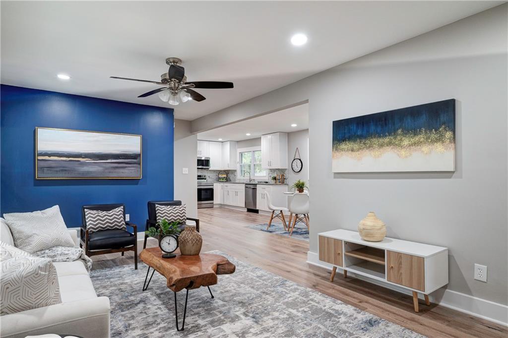 2181 Barbara Lane Decatur, GA 30032 - Photo 1 of 1 a living room with furniture and a flat screen tv