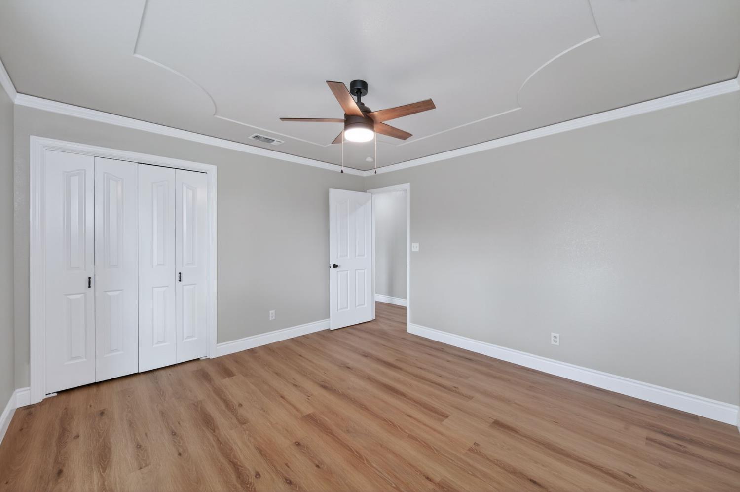 16564 Monreal Road Madera, CA 93636 - Photo 46 of 59 wooden floor in an empty room