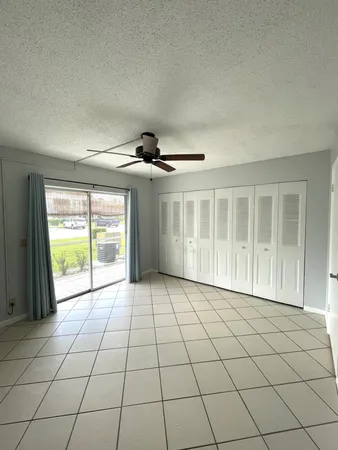 a view of an empty room and window