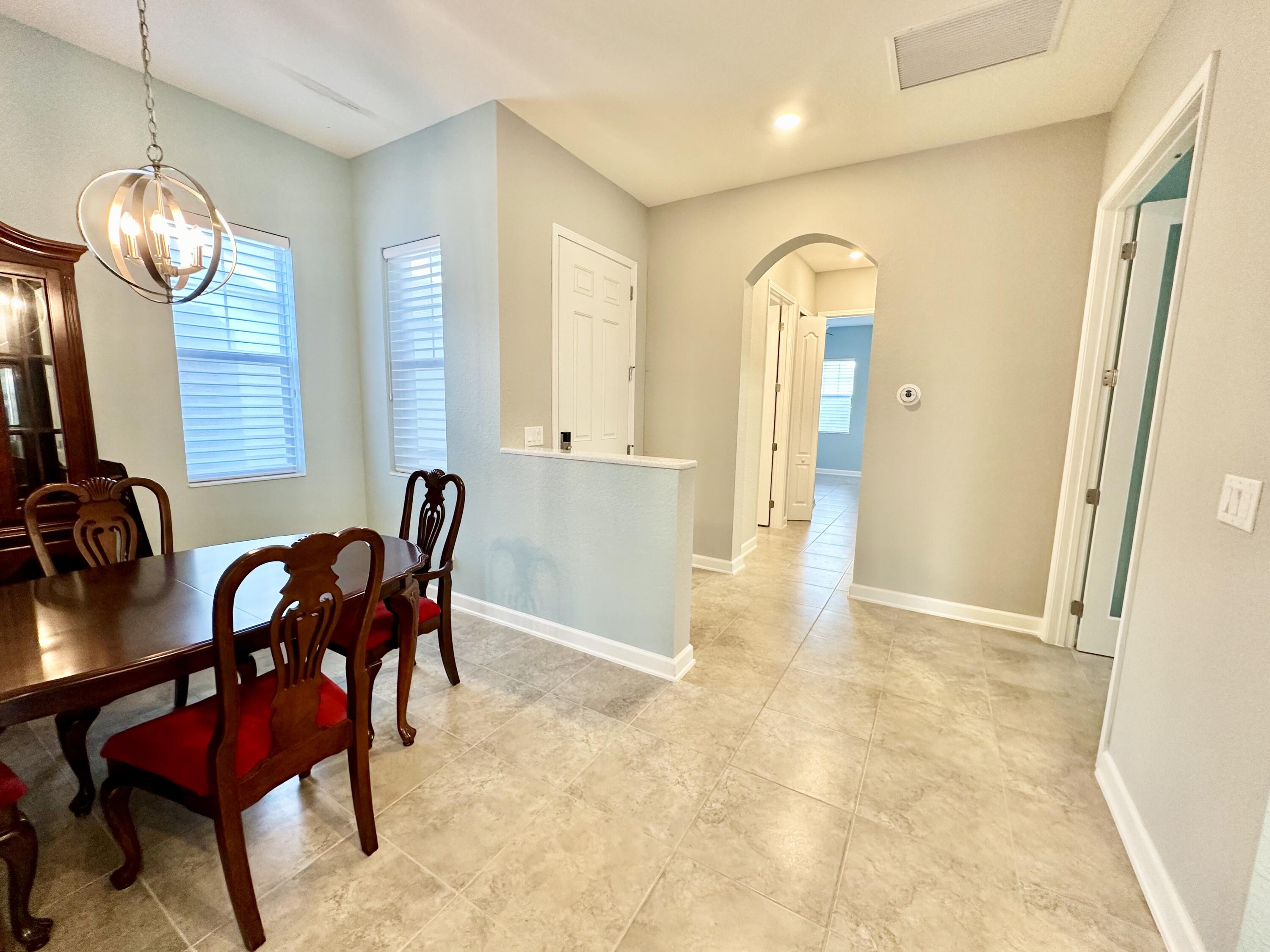 2491 Treasure Cay Lane Melbourne, FL 32940 - Photo 3 of 15 a view of a room with gym equipment