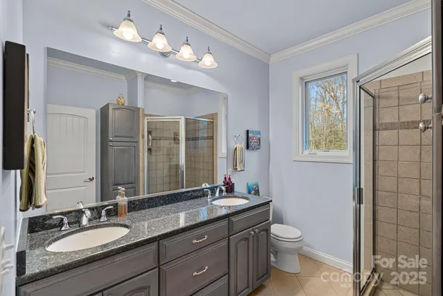 a utility room with a sink a washer and dryer