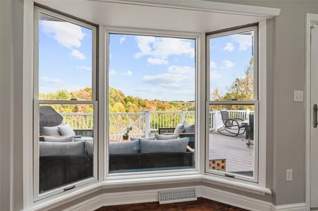 a view of a glass door and a porch