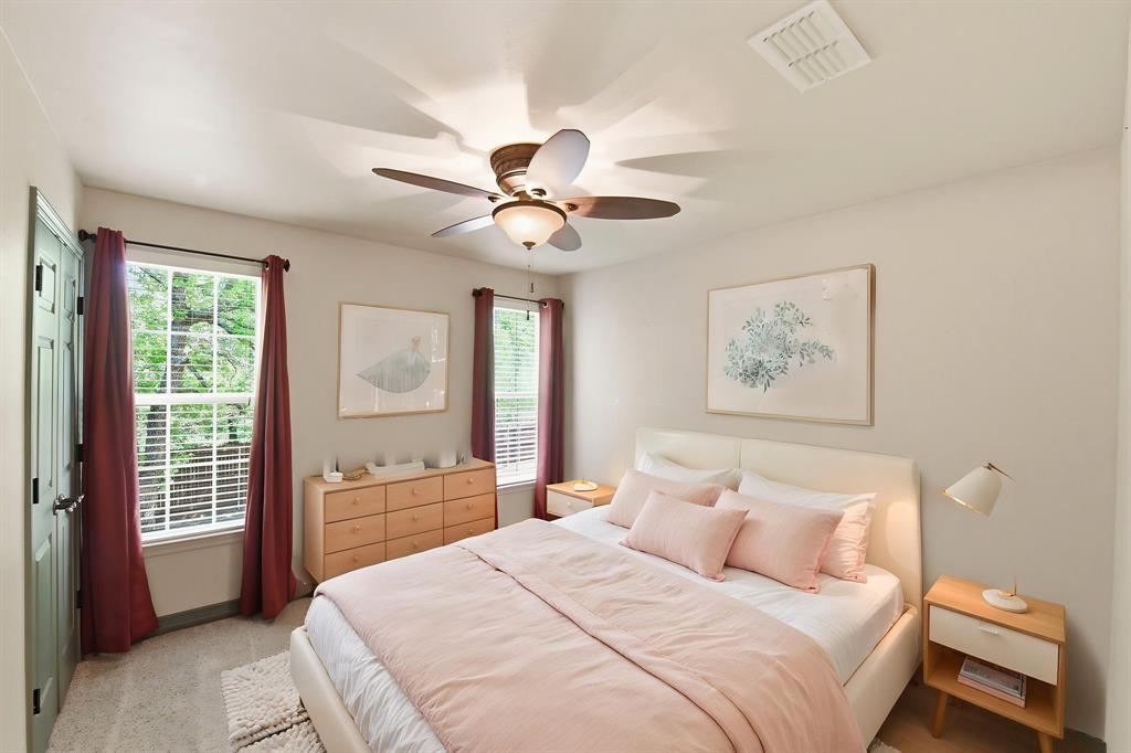 505 Highland Oak Point, TX 75068 - Photo 25 of 38 a bedroom with a large bed and a window