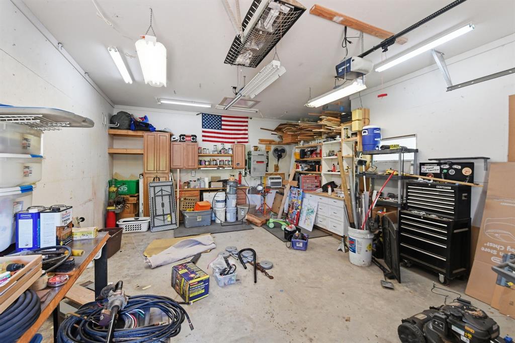 505 Highland Oak Point, TX 75068 - Photo 28 of 38 a view of a room with gym equipment