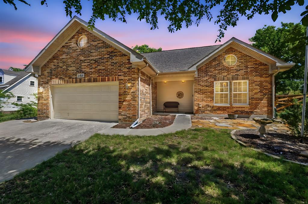 505 Highland Oak Point, TX 75068 - Photo 3 of 38 a view of a house with a yard