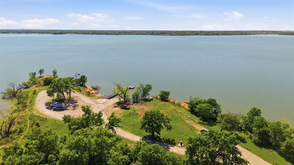 505 Highland Oak Point, TX 75068 - Photo 32 of 38 a view of a lake with a city