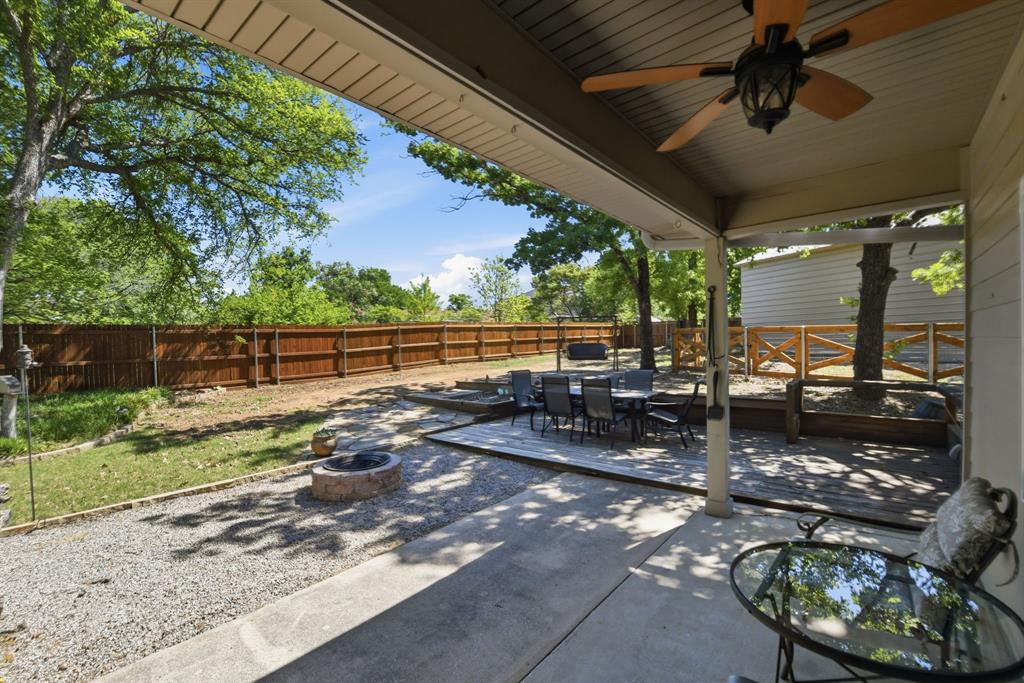 505 Highland Oak Point, TX 75068 - Photo 34 of 38 a view of a porch with furniture