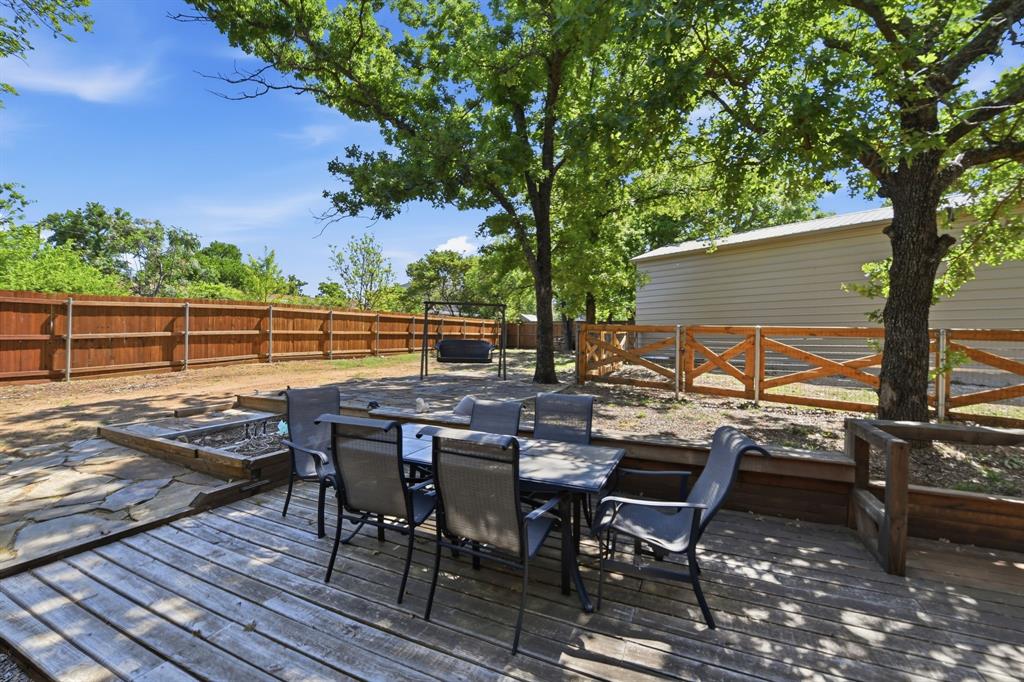 505 Highland Oak Point, TX 75068 - Photo 4 of 38 an outdoor view with patio