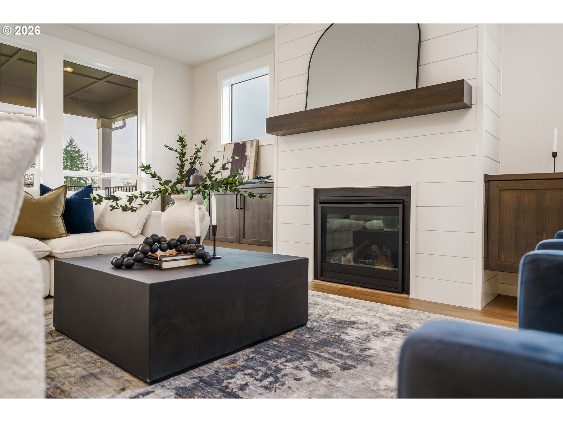 516 West 20th Way La Center, WA 98629 - Photo 17 of 45 a living room with furniture and a fireplace