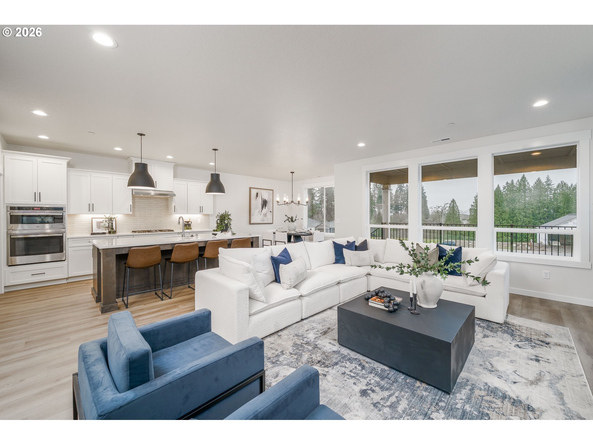 516 West 20th Way La Center, WA 98629 - Photo 19 of 45 a living room with furniture and a large window