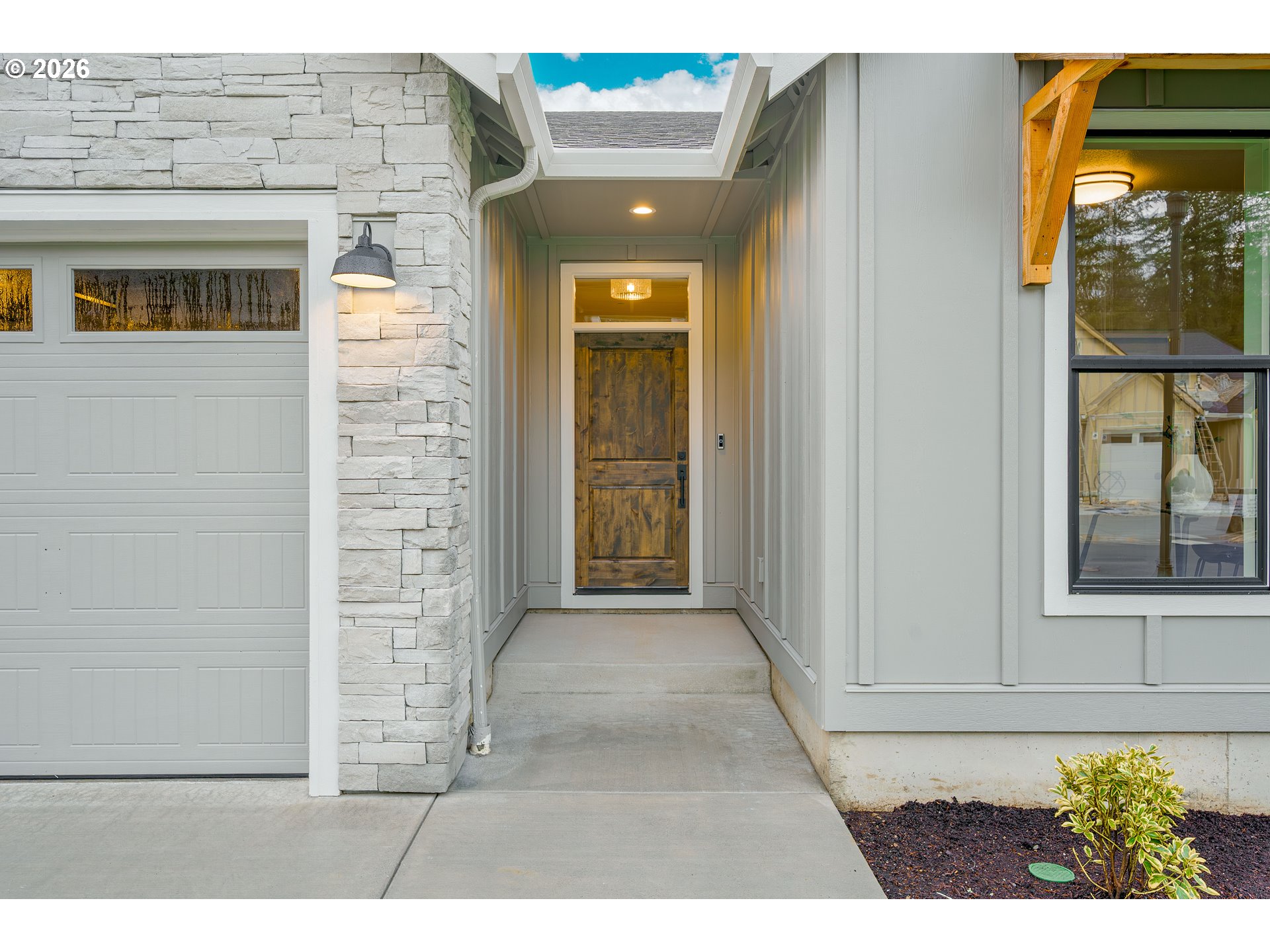 516 West 20th Way La Center, WA 98629 - Photo 3 of 45 a front view of a house with a yard