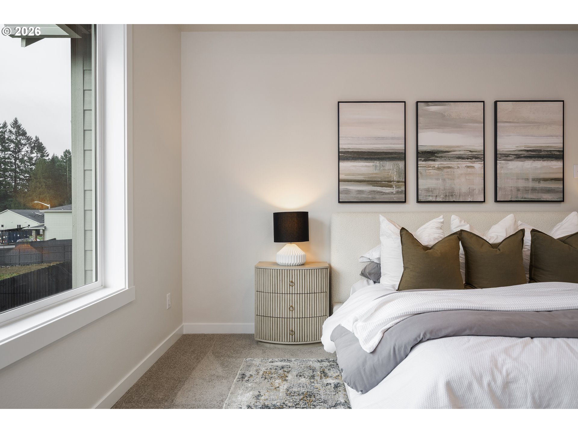 516 West 20th Way La Center, WA 98629 - Photo 32 of 45 a bedroom with a bed and window