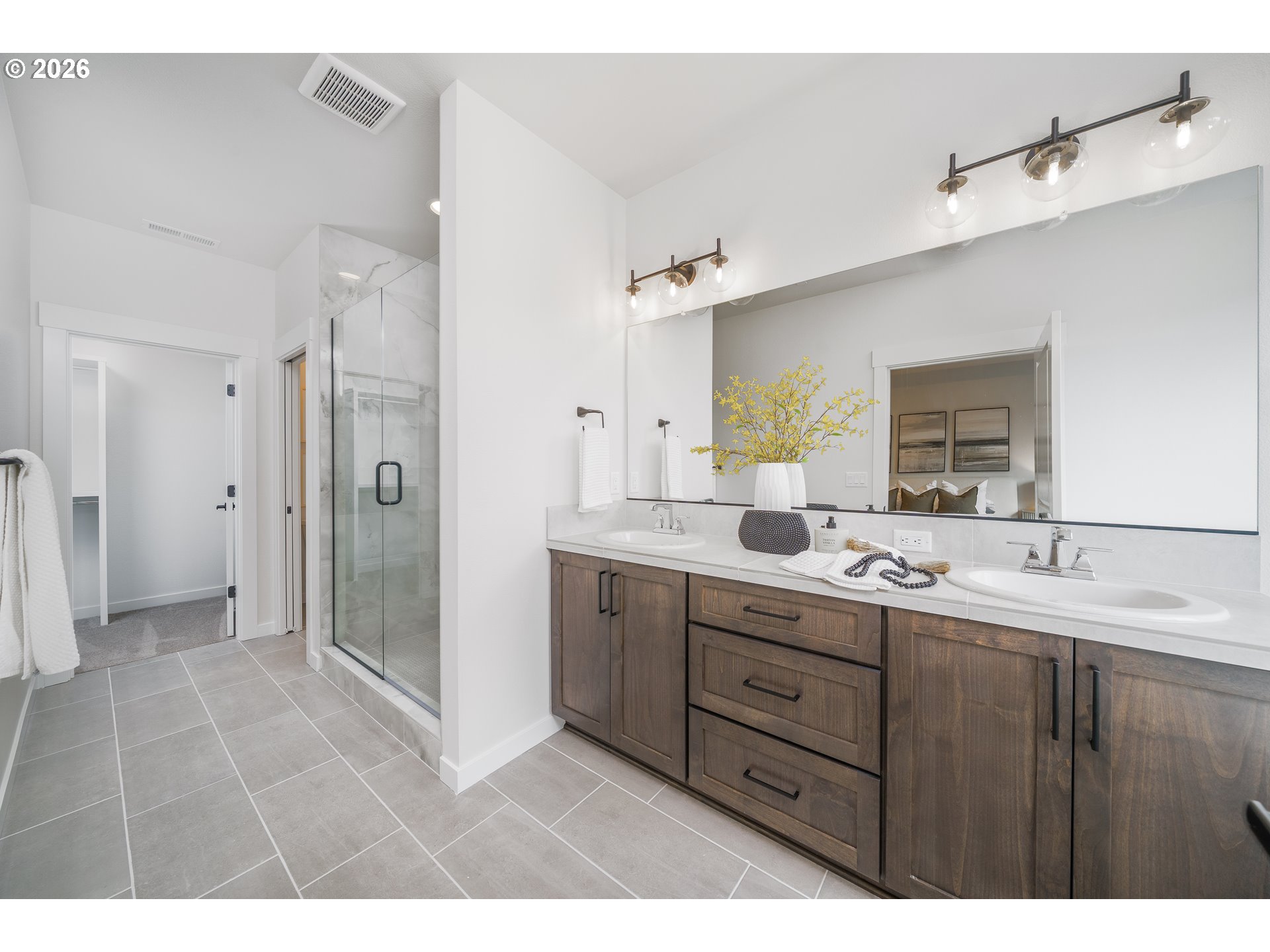516 West 20th Way La Center, WA 98629 - Photo 33 of 45 a bathroom with a double vanity sink mirror and double
