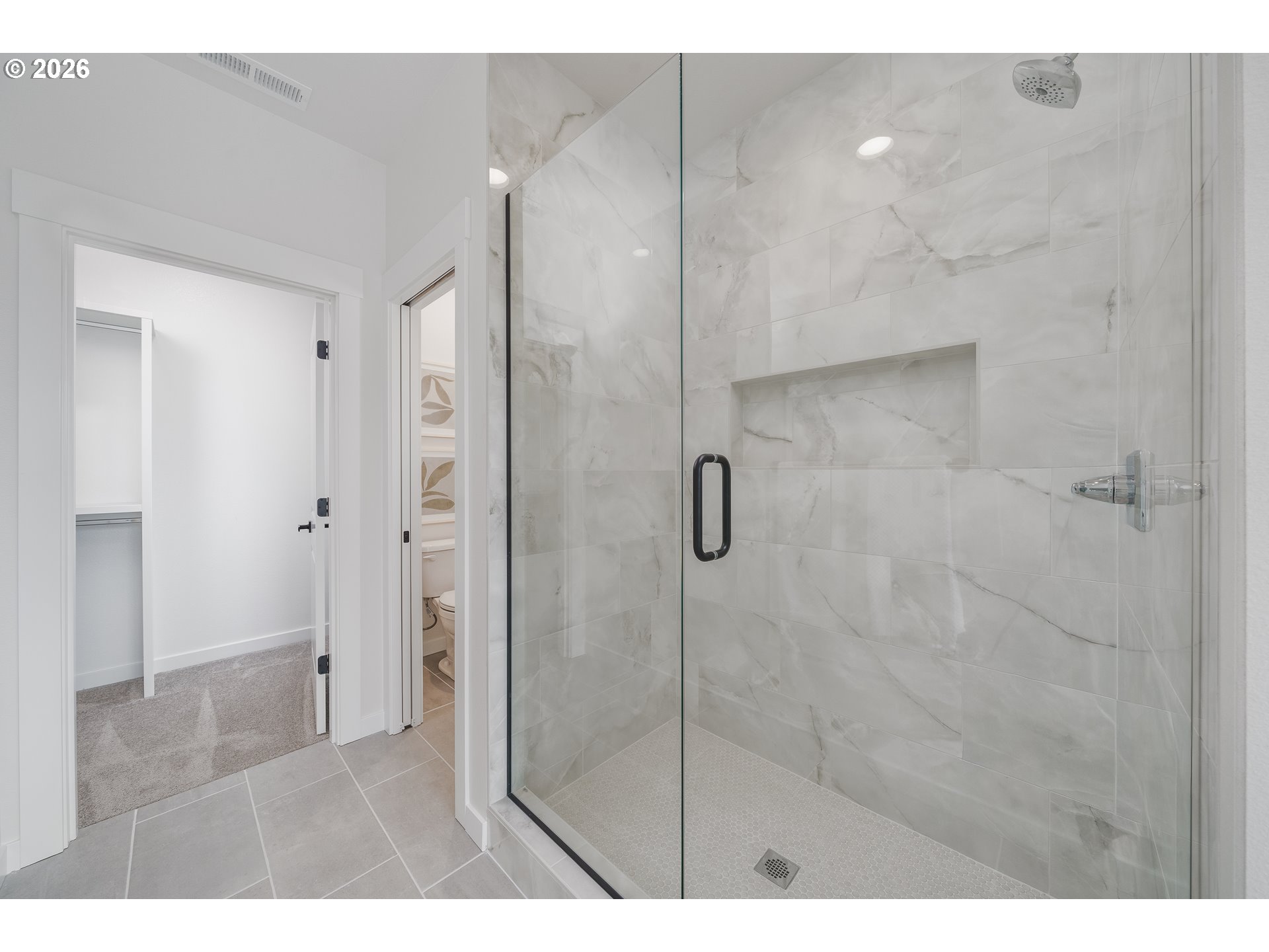 516 West 20th Way La Center, WA 98629 - Photo 35 of 45 a bathroom with a shower