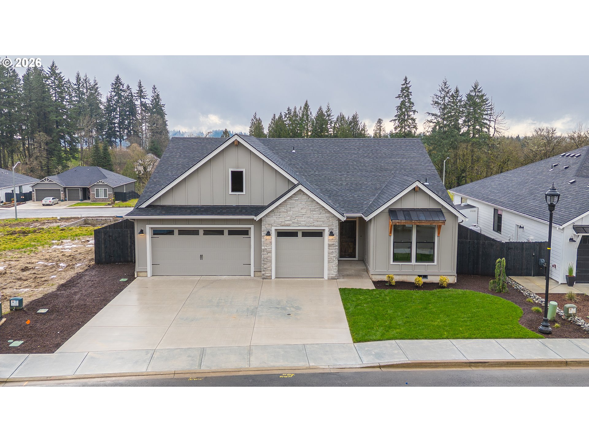 516 West 20th Way La Center, WA 98629 - Photo 41 of 45 a house view with a outdoor space