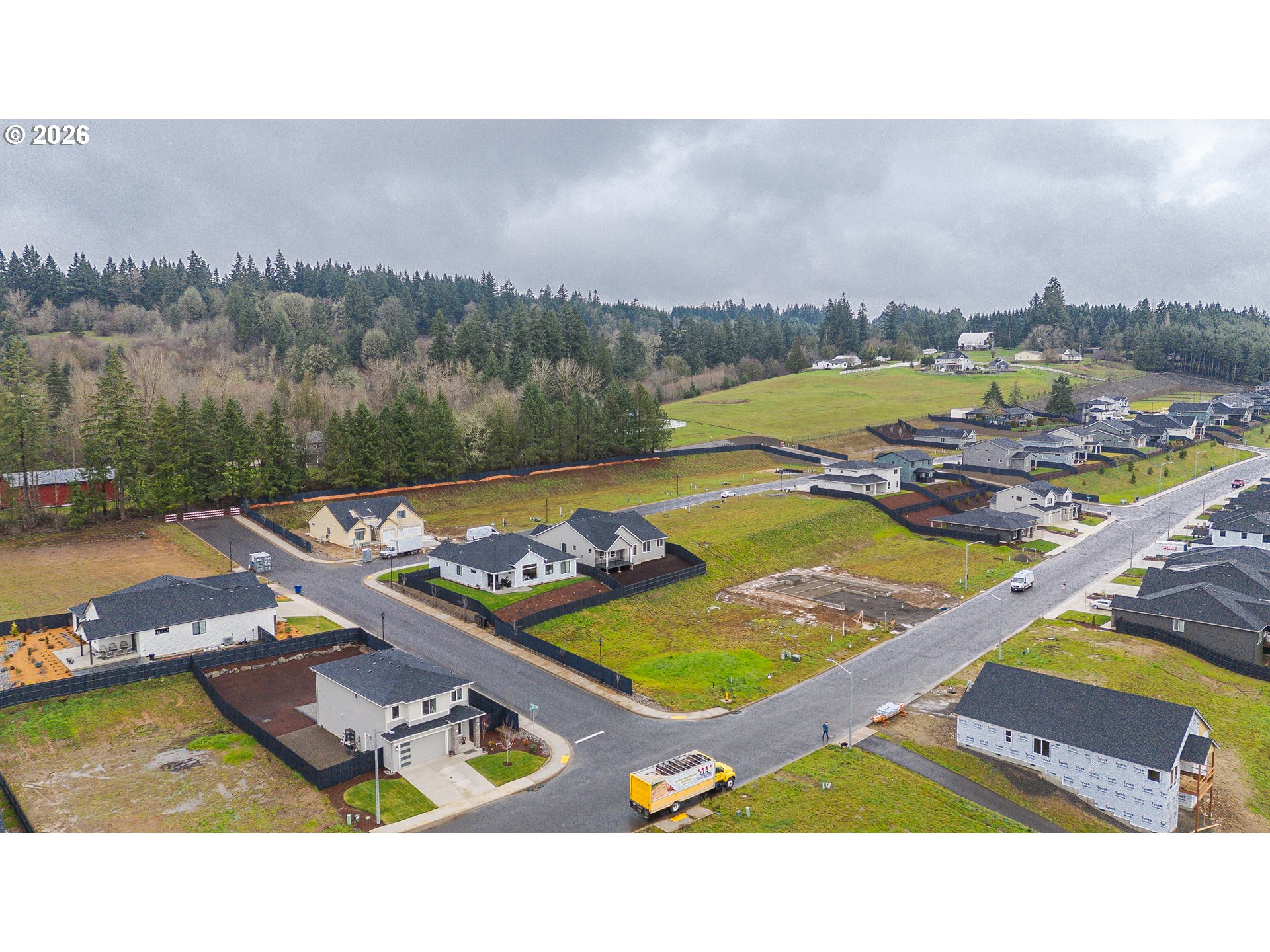 516 West 20th Way La Center, WA 98629 - Photo 45 of 45 a view of swimming pool and lake in back