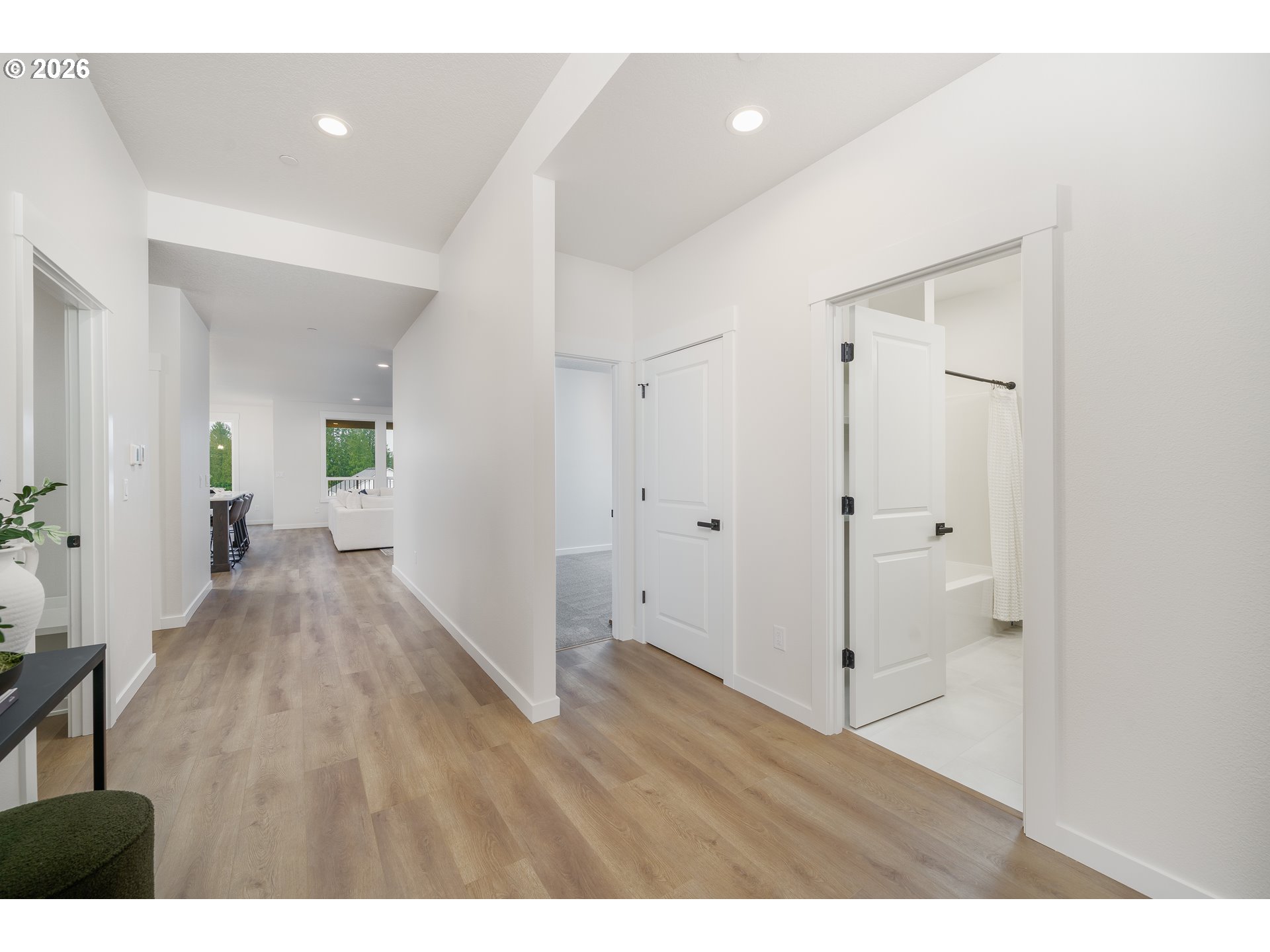 516 West 20th Way La Center, WA 98629 - Photo 6 of 45 a view of hallway with wooden floor