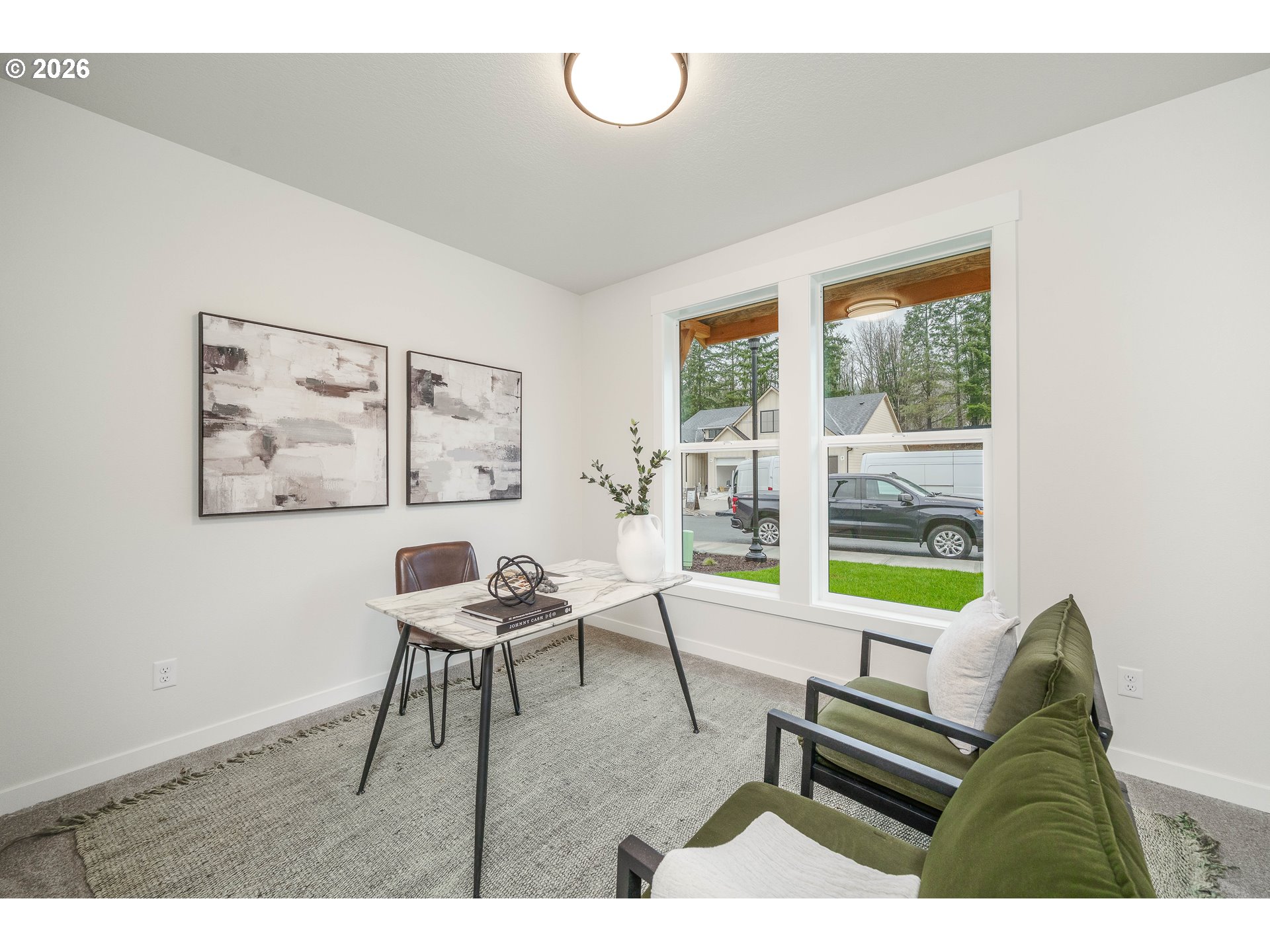 516 West 20th Way La Center, WA 98629 - Photo 8 of 45 a living room with furniture and a window