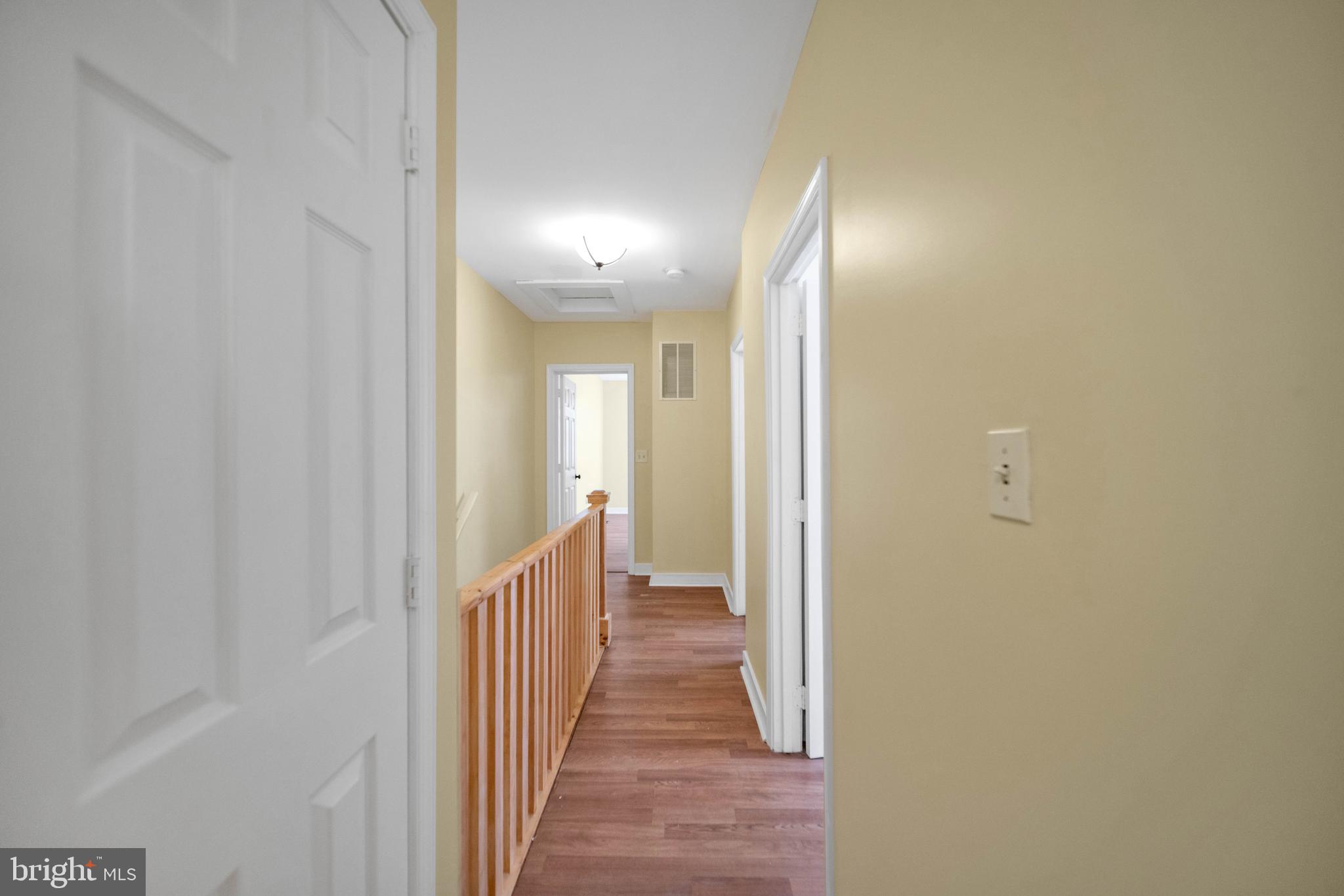 2712 Sherman Avenue Northwest Washington, DC 20001 - Photo 13 of 69 a view of a hallway with wooden floor