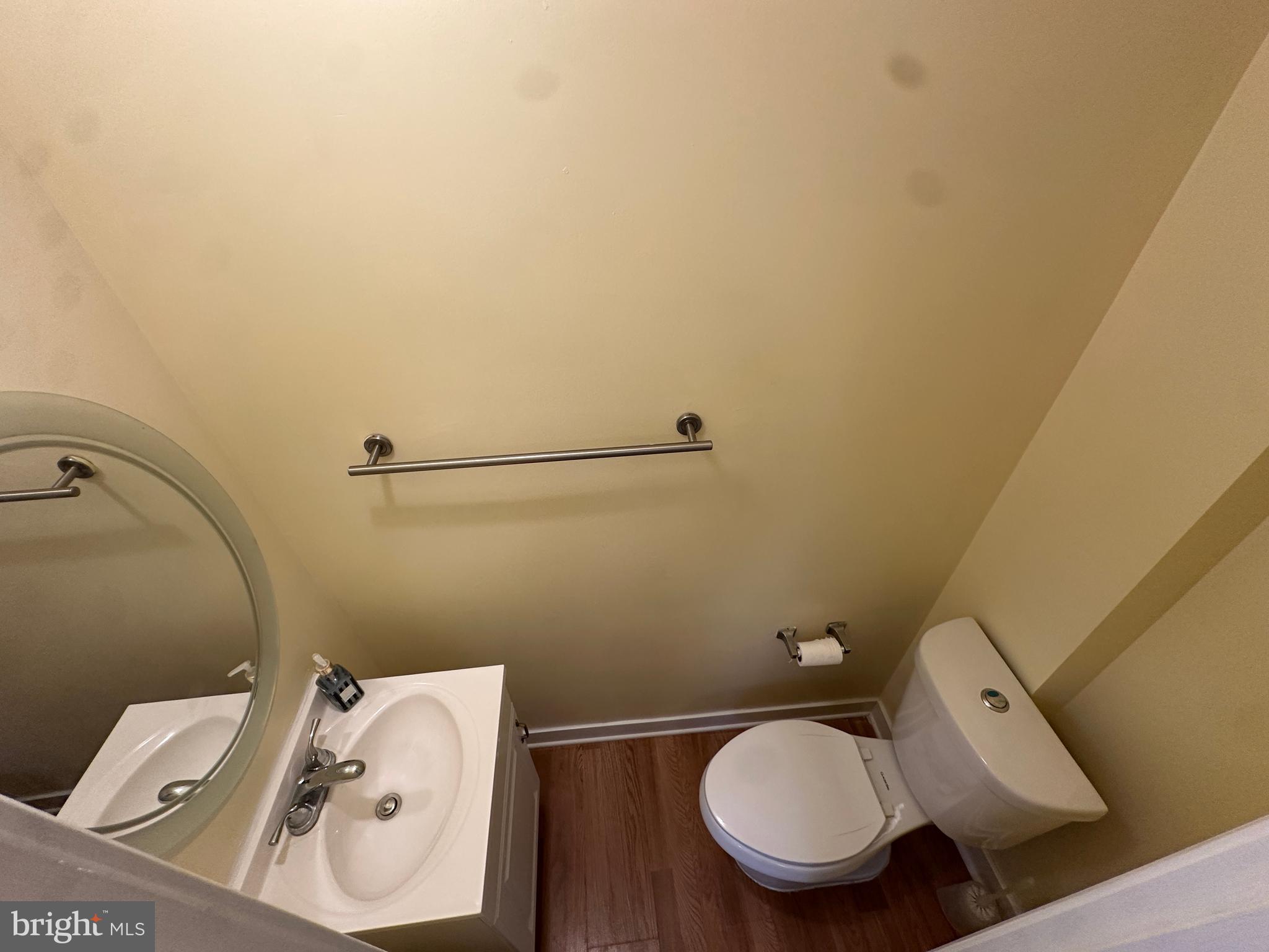 2712 Sherman Avenue Northwest Washington, DC 20001 - Photo 32 of 69 a bathroom with a toilet and a sink