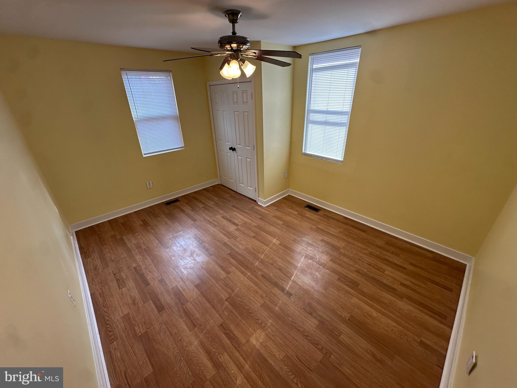 2712 Sherman Avenue Northwest Washington, DC 20001 - Photo 37 of 69 wooden floor in an empty room with a window
