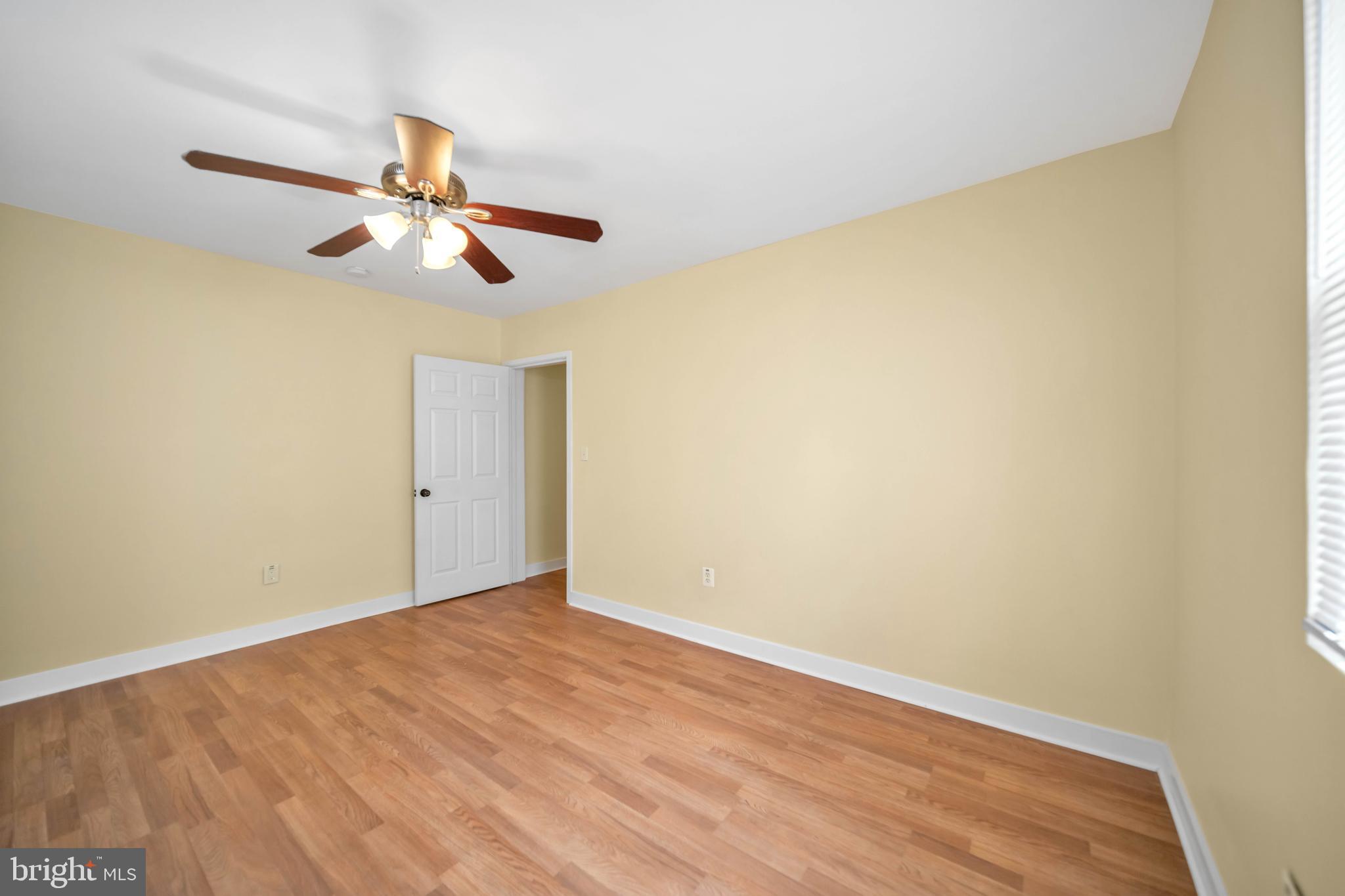2712 Sherman Avenue Northwest Washington, DC 20001 - Photo 58 of 69 wooden floor in an empty room