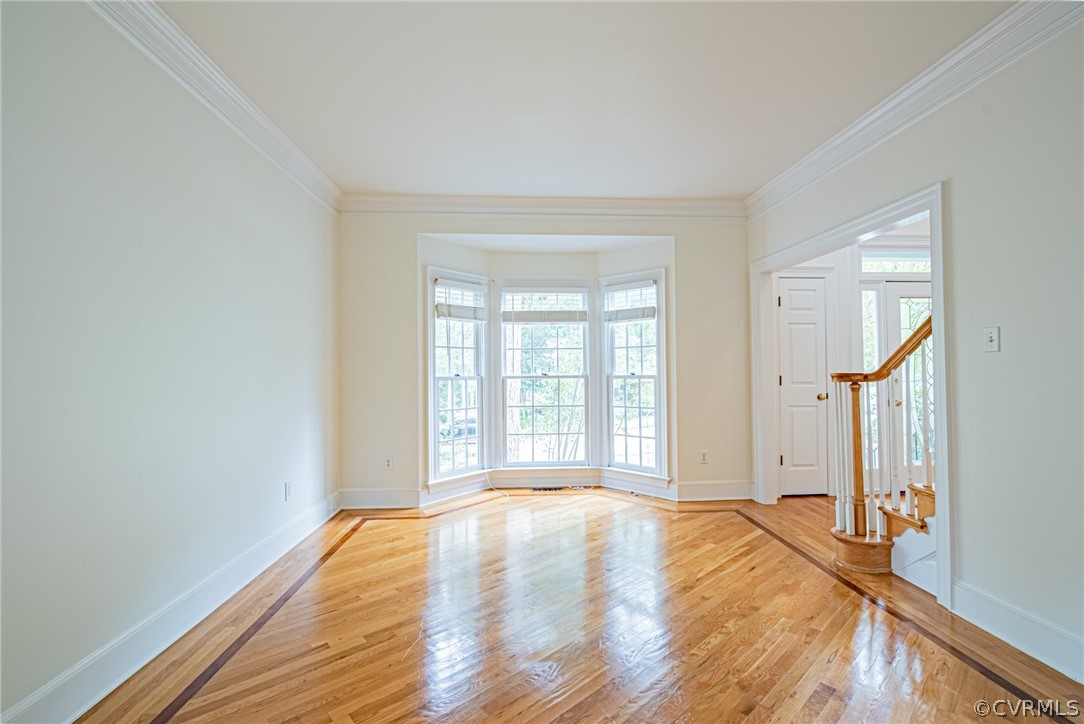 5314 Clipper Cove Road Midlothian, VA 23112 - Photo 11 of 47 a view of empty room with wooden floor and fan