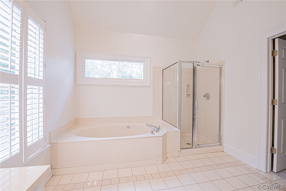 5314 Clipper Cove Road Midlothian, VA 23112 - Photo 29 of 47 a white bath tub sitting in a bathroom next to a window