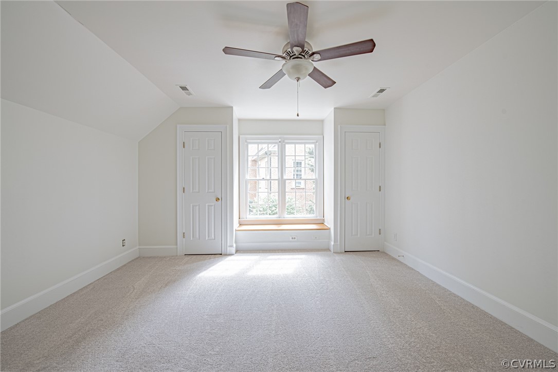 5314 Clipper Cove Road Midlothian, VA 23112 - Photo 35 of 47 an empty room with a ceiling fan and windows