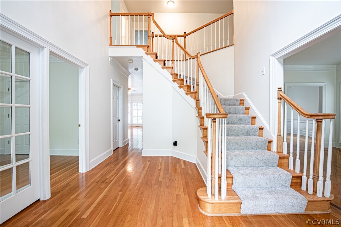 5314 Clipper Cove Road Midlothian, VA 23112 - Photo 4 of 47 a view of entryway with wooden floor and stairs