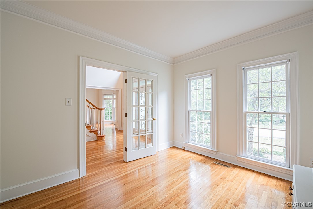 5314 Clipper Cove Road Midlothian, VA 23112 - Photo 5 of 47 an empty room with wooden floor and windows
