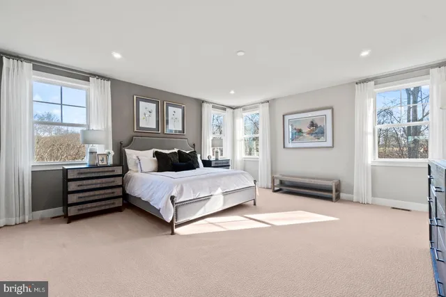 a bed room with a bed and a window