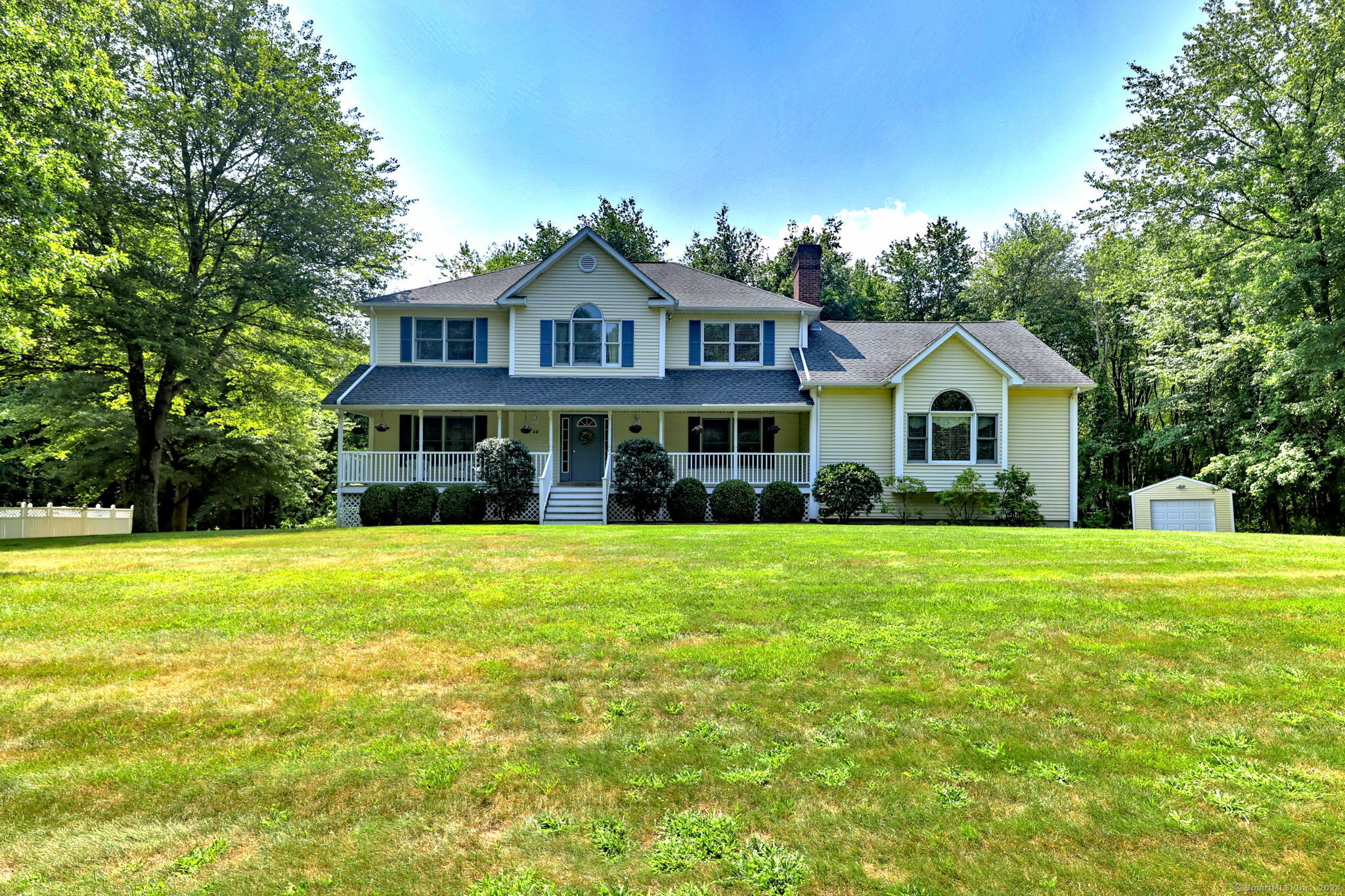 28 Deer River Lane Monroe, CT 06468 - Photo 1 of 1 a front of a house with a yard and trees