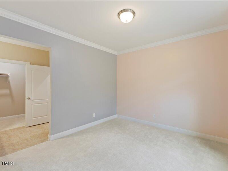 1814 Capstone Drive Durham, NC 27713 - Photo 23 of 32 an empty room with a empty space and window